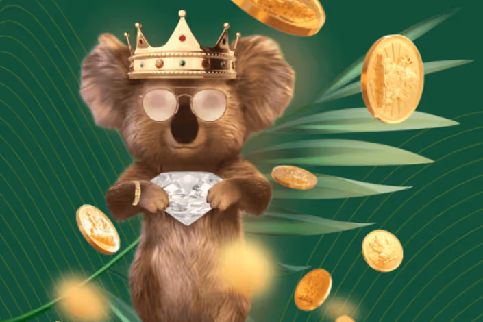 Crowned koala holding a diamond with falling coins