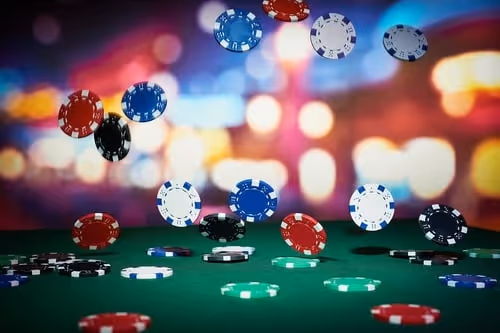 Online poker game with poker chips on a green table