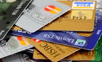 Pile of various credit and debit cards