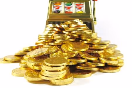 Slot machine overflowing with gold coins